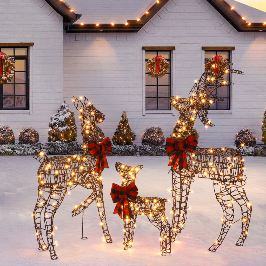 Lighted rattan reindeer family